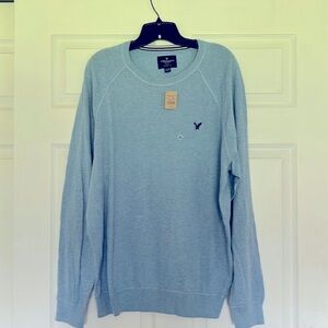 Men’s American eagle long sleeve sweater. Size XL. New with tags. Light blue.